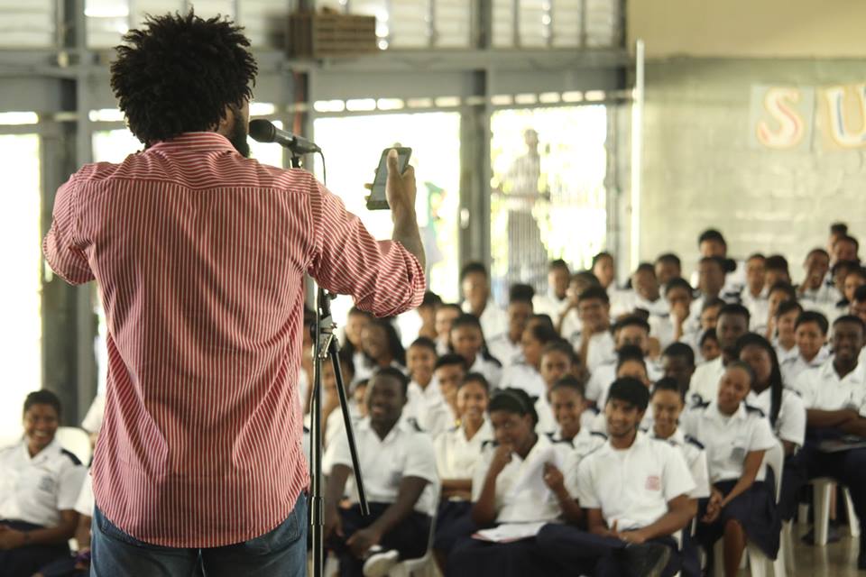 Marshall Davis Jones performing at El
Dorado East Secondary School, Trinidad and Tobago Courts Bocas Speak Out Tour 2015.