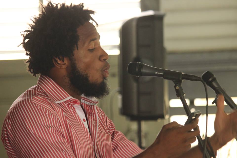 Marshall Davis Jones performing at El
Dorado East Secondary School, Trinidad and Tobago, Courts Bocas Speak Out Tour 2015.